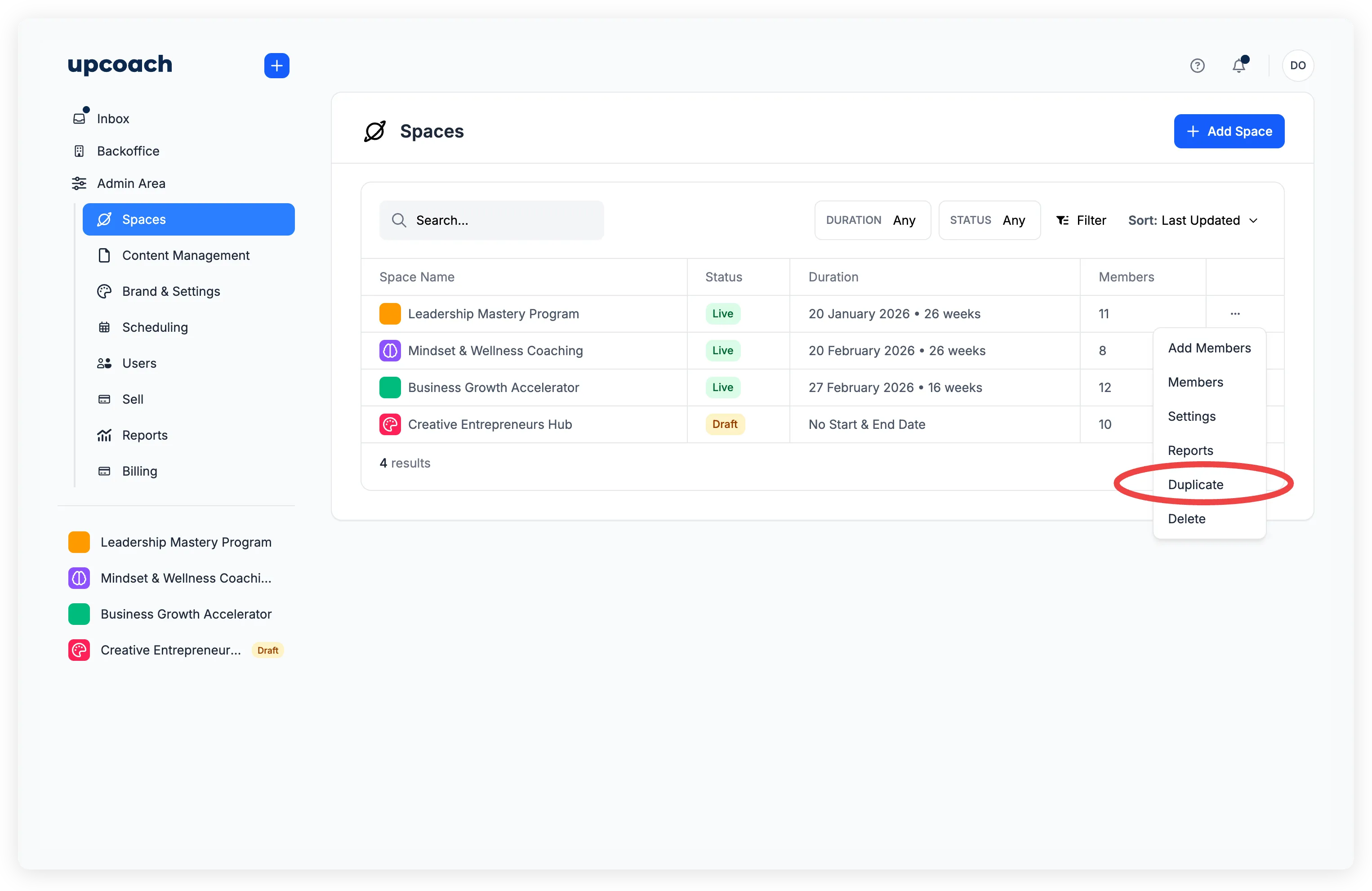Spaces page with ellipsis menu showing Duplicate option highlighted